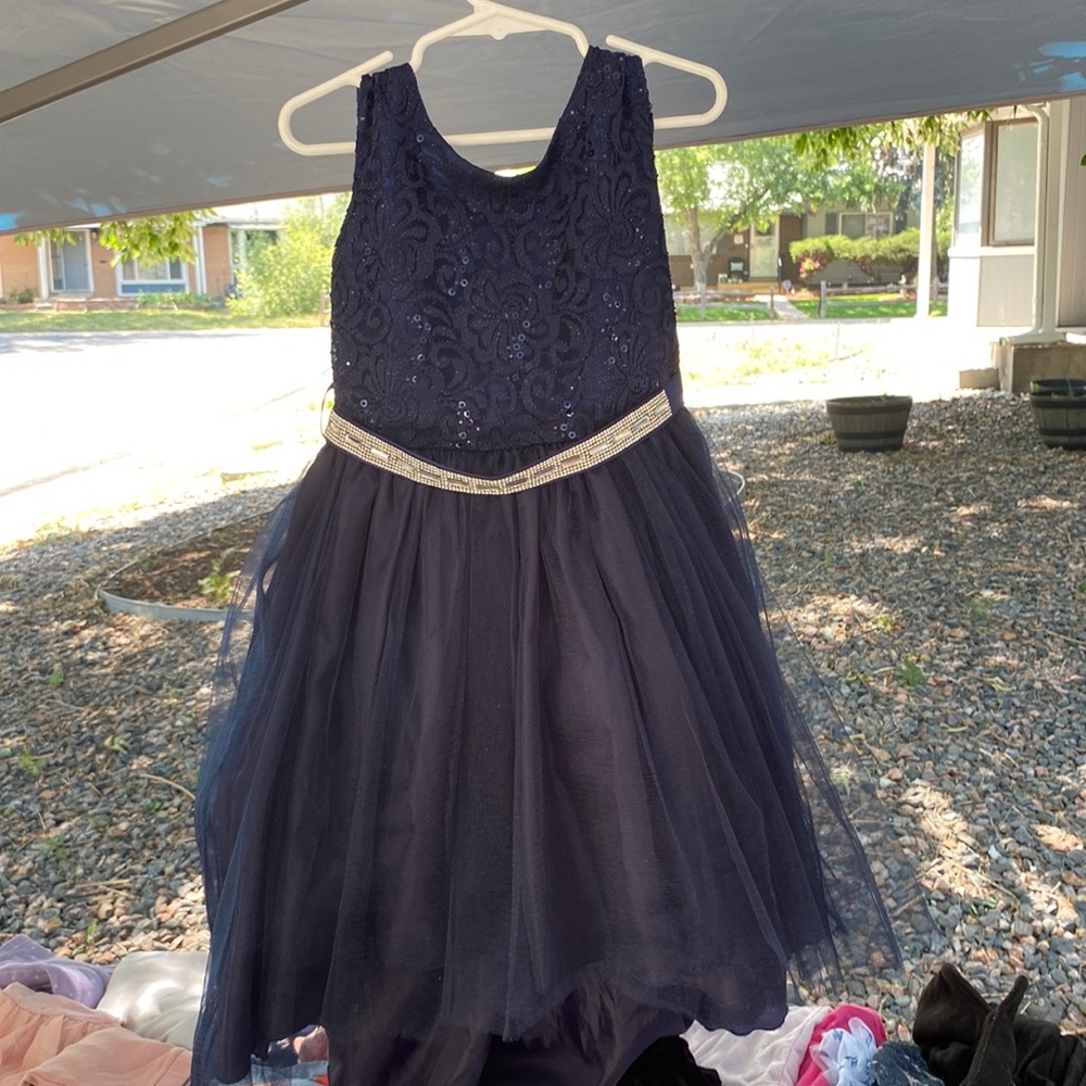 A navy blue dress with sparkles